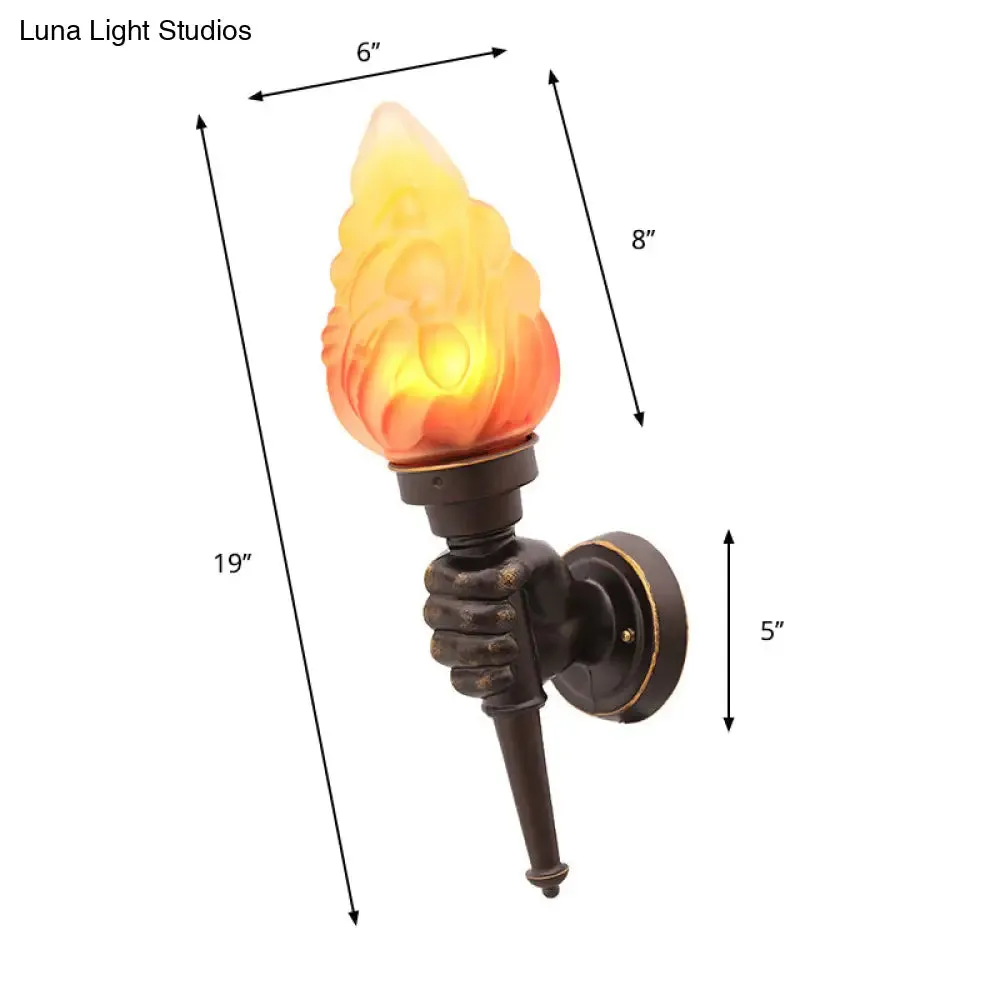 Black Wall Sconce with Amber Glass Torch and Hand Decor - Single Bulb Mount Light