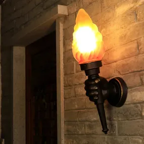 Black Wall Sconce with Amber Glass Torch and Hand Decor - Single Bulb Mount Light