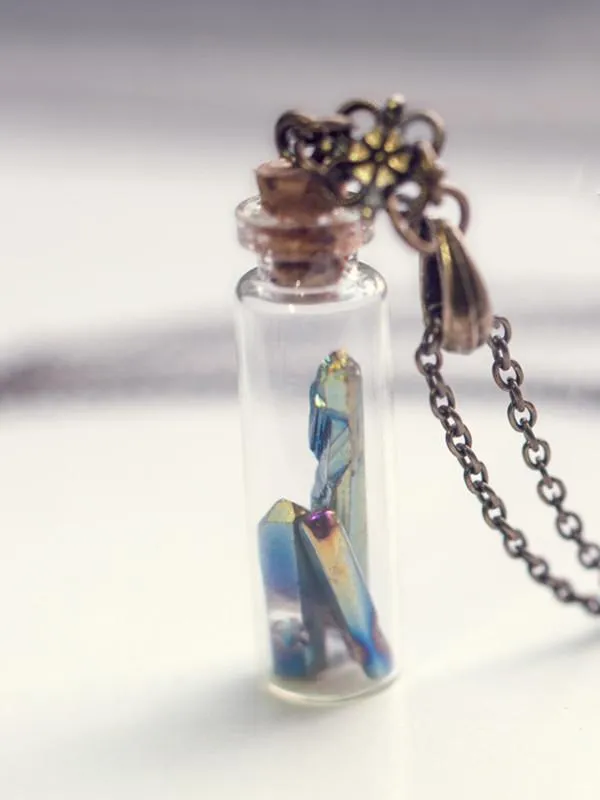 Glass vial pendant necklace with pointed crystal