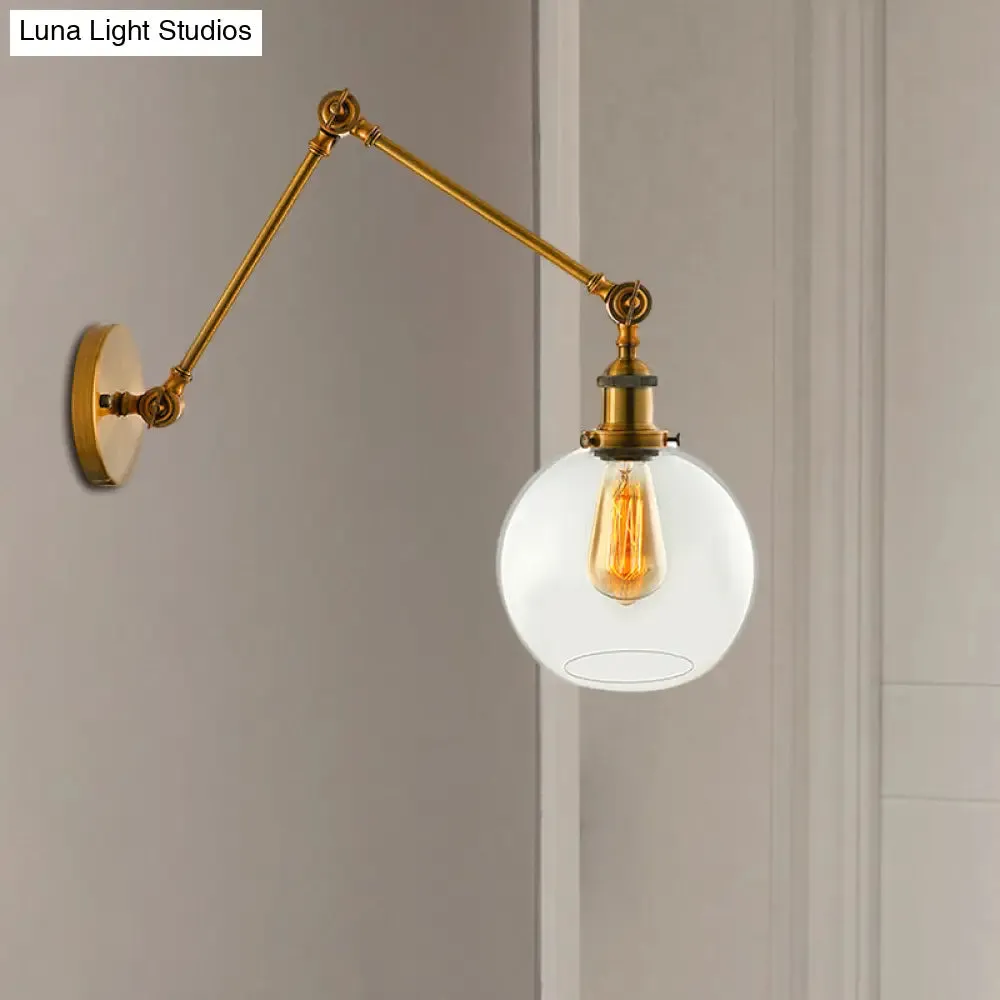 Vintage Brass Sconce: Clear Glass Spherical Lighting Fixture for Bedroom"